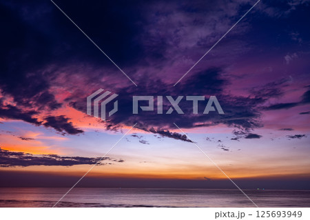 Aerial view sunset sky,Nature beautiful light sunset or sunrise over sea surface,Colorful sunset sky with clouds and waves in the ocean,Wide angle sea background Aerial view sunset sky,Nature beautiful light sunset or sunrise over sea surface,Colorful sunset sky with clouds and waves in the ocean,Wide angle sea background 125693949