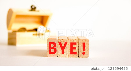 Bye symbol. Concept word Bye on beautiful wooden blocks. Beautiful wooden chest with coins. Beautiful white table white background. Business and bye concept. Copy space. 125694436