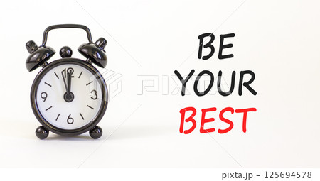 Motivational be your best symbol. Concept words Be your best on beautiful white paper. Beautiful white background. Black alarm clock. Business motivational be your best concept. Copy space. Motivational be your best symbol. Concept words Be your best on beautiful white paper. Beautiful white background. Black alarm clock. Business motivational be your best concept. Copy space. 125694578