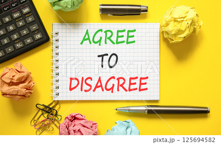 Agree to disagree symbol. Concept words Agree to disagree on beautiful white note. Black pen. Calculator. Beautiful yellow background. Business and agree to disagree concept. Copy space. 125694582