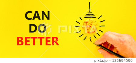 Can do better symbol. Concept words Can do better on beautiful yellow paper. Beautiful yellow background. Businessman hand with pen. Business and can do better concept. Copy space. Can do better symbol. Concept words Can do better on beautiful yellow paper. Beautiful yellow background. Businessman hand with pen. Business and can do better concept. Copy space. 125694590