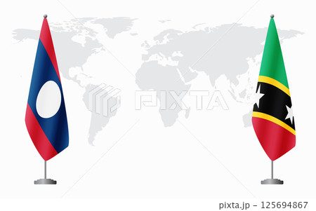 Laos and Saint Kitts and Nevis flags for official meeti 125694867