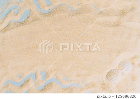 summer background of beach golden sand with with blue waves 125696820