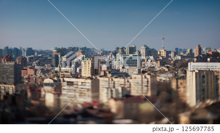Expansive urban cityscape with a subtle tilt-shift effect 125697785
