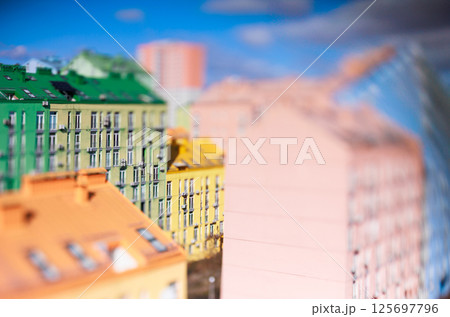Vibrant tilt-shift image showcasing the colorful modern residential architecture of Comfort Town 125697796