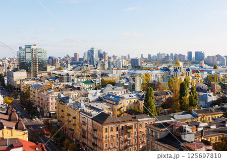 Elevated view of the Kyiv cityscape, prominently featuring the historic St Volodymyr's Cathedral Elevated view of the Kyiv cityscape, prominently featuring the historic St Volodymyr's Cathedral 125697810