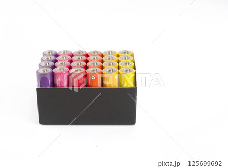 Packet with 24 colour cell batteries isolated on white background 125699692