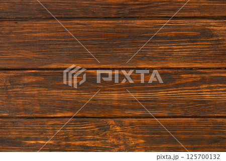 Dark brown wooden background, wood texture top view Dark brown wooden background, wood texture top view 125700132