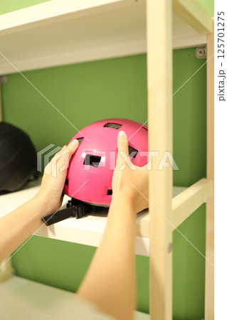 Bicycle Helmet in the Shelf Bicycle Helmet in the Shelf 125701275
