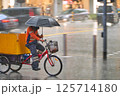 Cycling for work in pouring rain 125714180