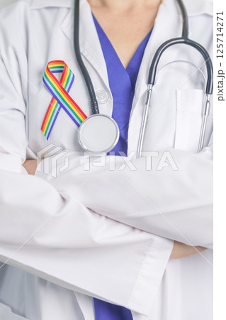 Doctor with LGBTQ Rainbow ribbon for Support Lesbian, Gay, Bisexual, Transgender and Queer community and happy Pride month concept 125714271