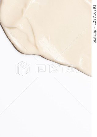 The texture of a cosmetic cream for the body or face The texture of a cosmetic cream for the body or face 125716293