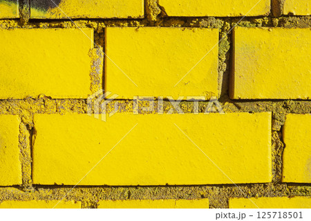 Yellow stone wall, stones, bricks, stone texture, color surface Yellow stone wall, stones, bricks, stone texture, color surface 125718501