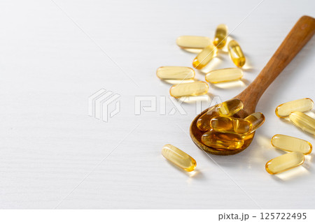 Capsule of omega 3, 6, 9 fish oil, vitamin isolated on white background. Capsule of omega 3, 6, 9 fish oil, vitamin isolated on white background. 125722495