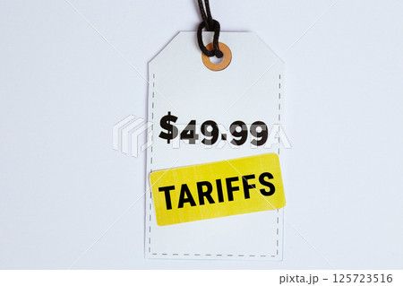 9.99 Price Tag with Tariff Sticker on White 9.99 Price Tag with Tariff Sticker on White 125723516