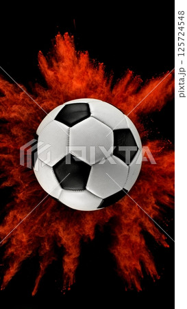 Soccer ball with coloured powder explosion. Soccer ball with coloured powder explosion. 125724548