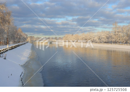 Winter Serenity A Beautiful Snowy River Landscape Amidst Natures Calm and Blissful Atmosphere Winter Serenity A Beautiful Snowy River Landscape Amidst Natures Calm and Blissful Atmosphere 125725508