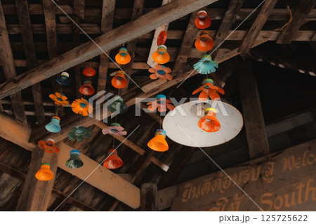 Beautiful and Colorful Hanging Decorations in a Cozy Rustic Space with Unique Details and Style Beautiful and Colorful Hanging Decorations in a Cozy Rustic Space with Unique Details and Style 125725622
