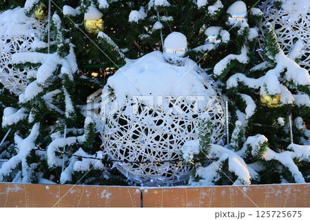 Enjoy the enchanting Winter Wonderland Christmas Decorations adorned with snow this season 125725675