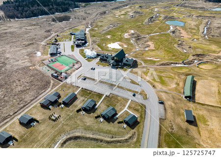A Stunning Aerial View of a Recreational Base Featuring Various Facilities and Lodges A Stunning Aerial View of a Recreational Base Featuring Various Facilities and Lodges 125725747