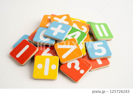 Number wood block cubes for learning Mathematic, education math concept. 125726283