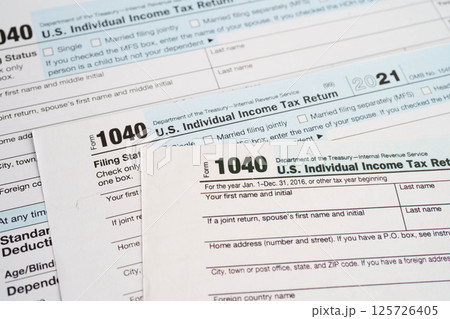 Tax form 1040 U.S. Individual Income Tax Return, business finance concept. Tax form 1040 U.S. Individual Income Tax Return, business finance concept. 125726405