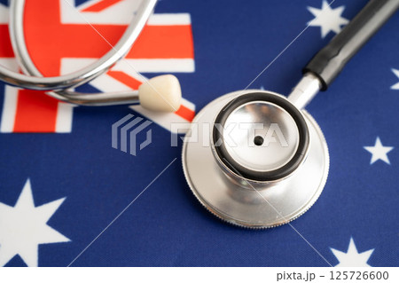 Australia flag with black stethoscope, Business and finance concept. Australia flag with black stethoscope, Business and finance concept. 125726600