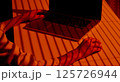 Shadows and Hands Using Laptop with External Mouse. 125726944