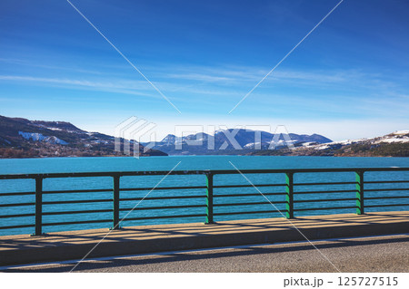 View of Serre-Poncon mountain lake in winter from the bridge. Hautes Alpes, France 125727515