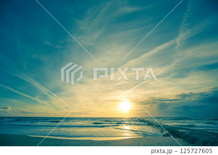 Seascape in the evening. Seacoast of Costa da Caparica city at sunset. Almada, Portugal 125727605