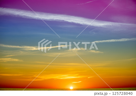Colorful cloudy sky at sunset. Gradient color. Sky texture. Abstract nature background Colorful cloudy sky at sunset. Gradient color. Sky texture. Abstract nature background 125728040