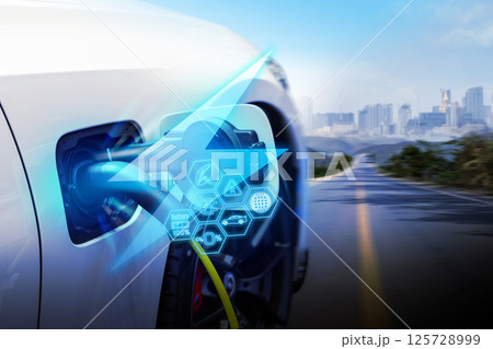Power cable pump plug in charging power to electric vehicle EV car. 125728999