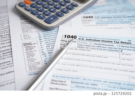 Tax form 1040 U.S. Individual Income Tax Return, business finance. 125729202