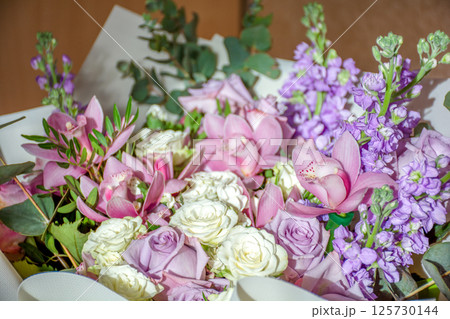 Large beautiful bouquet with pink, white and lilac flowers, greeting card, selective focus Large beautiful bouquet with pink, white and lilac flowers, greeting card, selective focus 125730144