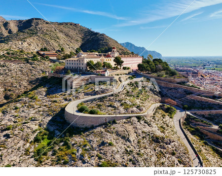 Curvy road goes up hill of San Miguel Diocesan Seminary. Orihuela Curvy road goes up hill of San Miguel Diocesan Seminary. Orihuela 125730825