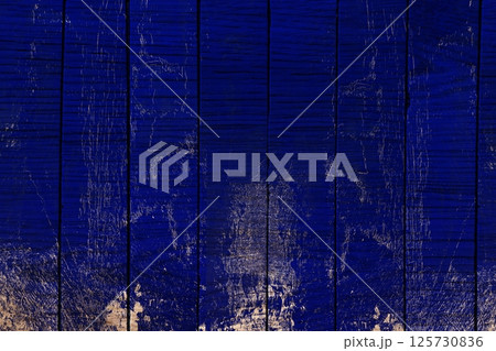 青ペンキが剥がれた木の板テクスチャ 125730836