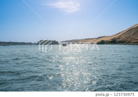 Scenic Nile River View near Aswan Dam, Egypt. 125730975