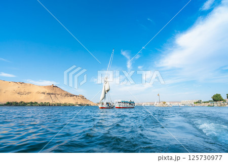 Felucca Journey on Nile River Near Aswan High Dam in Spring. 125730977
