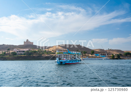 Tourist Boat on Nile River, Aswan, Egypt. 125730980