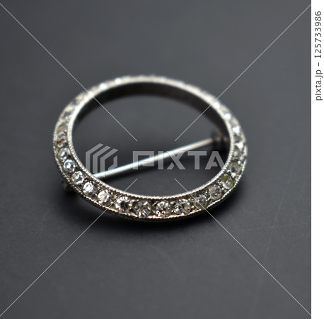 Flat background brooch floral design vintage womens photo Flat background brooch floral design vintage womens photo 125733986