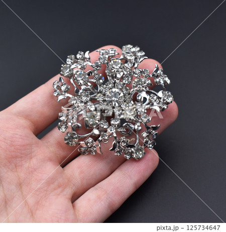 Soft fabric background floral brooch vintage photo 125734647