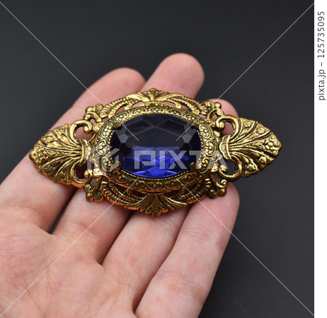 Vintage floral brooch laid flat feminine jewelry photo 125735095