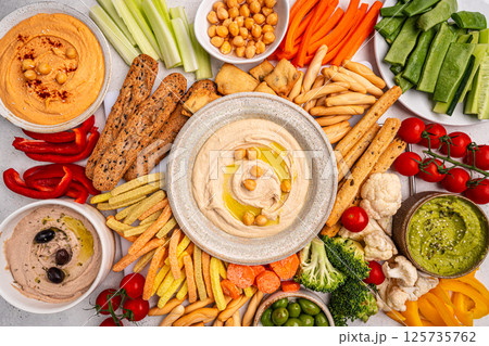 Various hummus dips, healthy and vegan snack 125735762