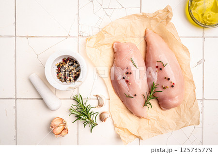 Raw chicken fillet or breasts 125735779