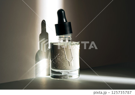 Face serum oil in the sun. 125735787