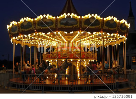 Night Magic at the Vintage Carousel with Twinkling Lights 125736091