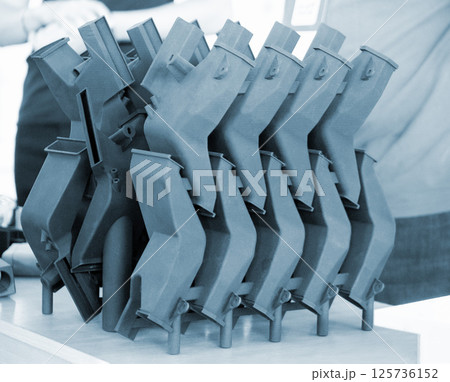 Plastic model printed on 3D printer from powder close-up. Objects created on 3D printer from polyamide powder. New 3D printing technology. Modern additive progressive 3D printing technologies. MJF 125736152