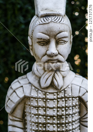 Terracotta army soldier statue exhibiting traditional chinese armor Terracotta army soldier statue exhibiting traditional chinese armor 125737376