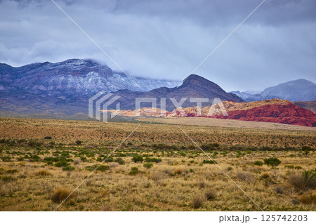 Red Rock Canyon Sandstone and Clouds at Sunrise Low Perspective 125742203