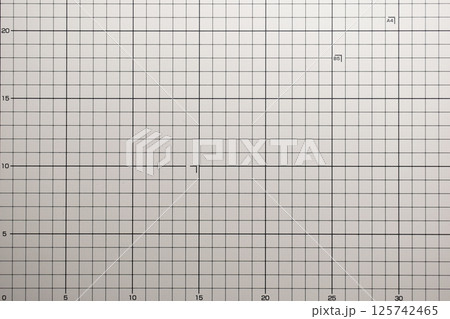 gray cutting mat board background with line and scale measure guide pattern for object art design gray cutting mat board background with line and scale measure guide pattern for object art design 125742465